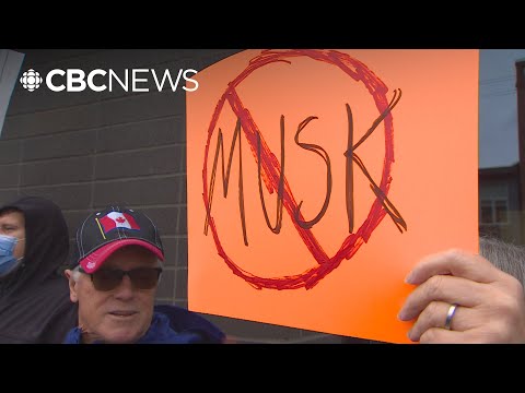 Protesters rally at Vancouver Tesla dealerships against Elon Musk