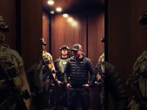 When I entered the elevator with the military